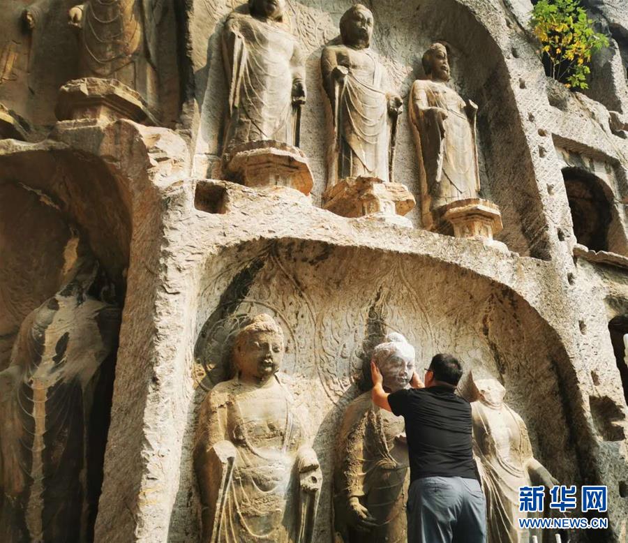 （圖文互動）（4）合體了，龍門石窟流散佛首首次實現(xiàn)“數(shù)字復(fù)位”