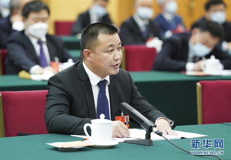 （新華全媒頭條·圖文互動）（11）從人民中汲取磅礴力量——習近平總書記同出席2020年全國兩會人大代表、政協(xié)委員共商國是紀實