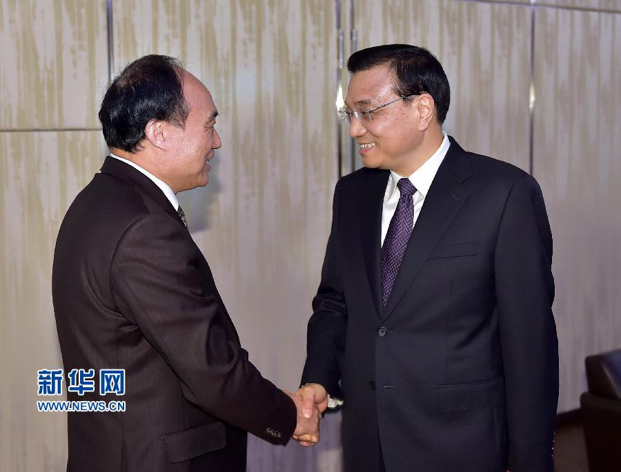 1月22日，中國國務院總理李克強在瑞士蘇黎世會見國際電信聯(lián)盟秘書長趙厚麟。 新華社記者 李濤 攝 
