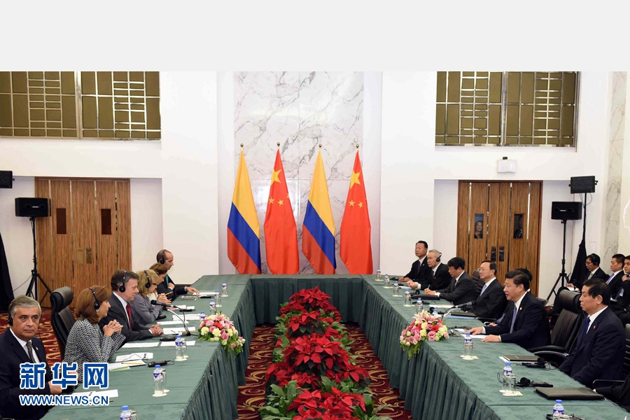 11月18日，國家主席習(xí)近平在菲律賓馬尼拉會見哥倫比亞總統(tǒng)桑托斯。 新華社記者 饒愛民 攝